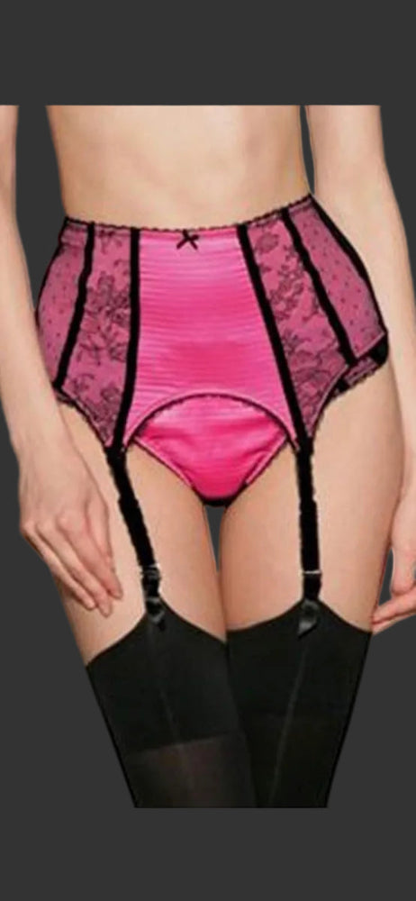 Pink lingerie with black lace details and garter straps on a white background